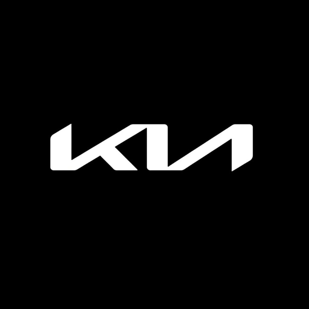 The Kia logo on a black background.