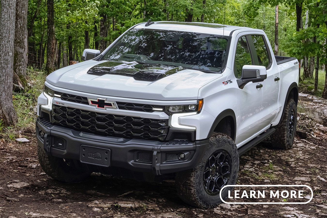 The 2019 chevrolet silverado is parked in the woods.