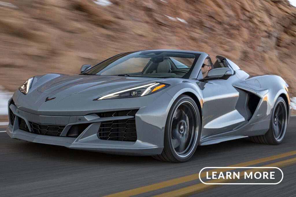 The 2019 chevrolet corvette stingray driving down a mountain road.