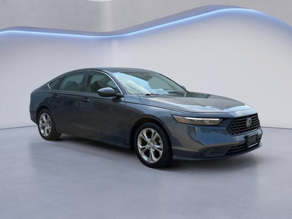 Gray Honda sedan in studio