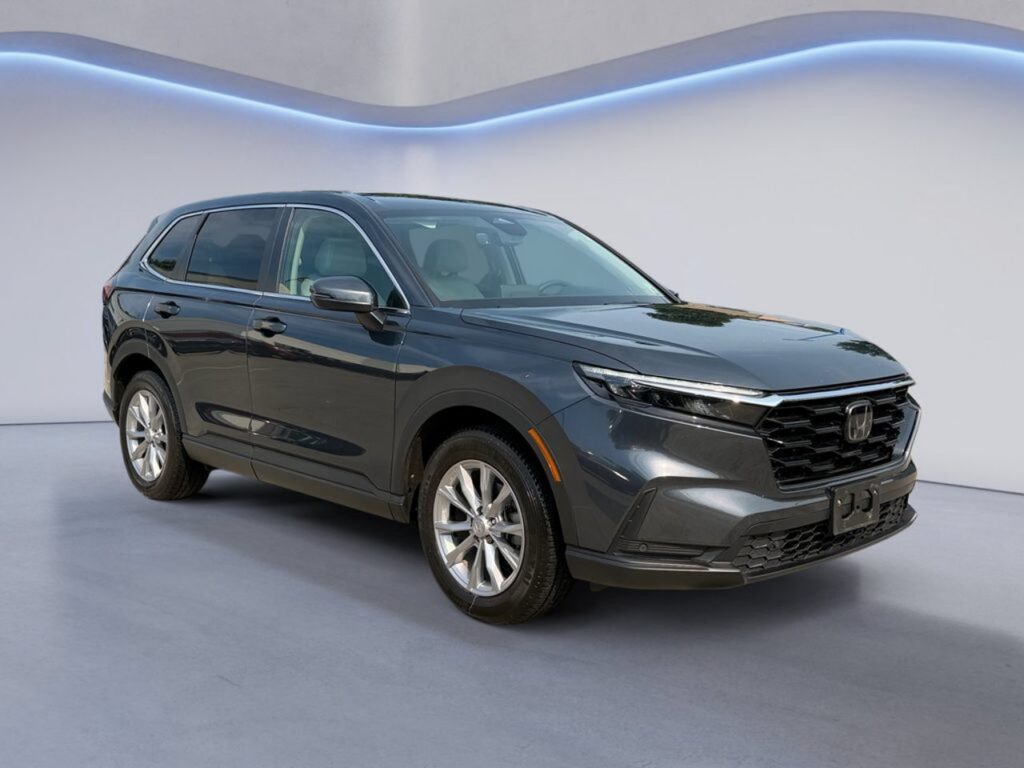 Gray Honda CR-V parked in showroom