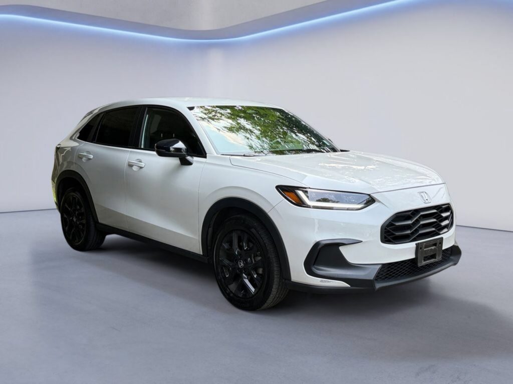 White compact SUV parked in studio