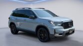 Light gray Honda SUV with black wheels