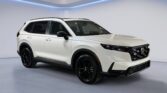 White Honda SUV with black wheels in studio