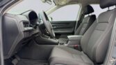 Car interior showing front driver and passenger seats