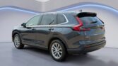 Gray Honda CR-V SUV in modern studio