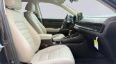 Beige leather front seats and dashboard