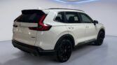White SUV three-quarter rear view