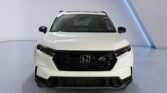 White Honda SUV front view in showroom