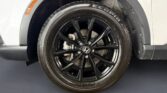 Black Honda alloy wheel and tire