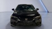Front view of black Honda sedan in showroom