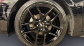 Black Honda alloy wheel and brake caliper