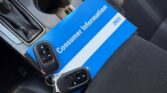 Consumer information booklet with car key fobs