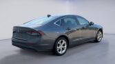 Gray modern sedan, rear three-quarter view
