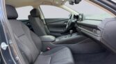 Modern car interior with front seats and dashboard