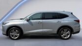 Silver crossover SUV side profile in studio