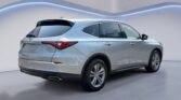 Silver crossover SUV in modern showroom