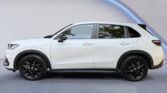 White compact SUV side profile studio shot