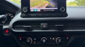 Car dashboard with rearview camera display