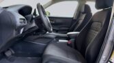 Compact car front interior with black cloth seats