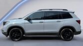 Silver SUV side profile on studio backdrop