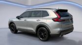 Silver compact SUV in studio showroom