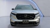 Silver Honda SUV front view on gray backdrop