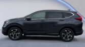 Dark gray SUV side view in studio