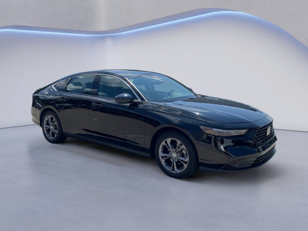 Sleek black sedan photographed in studio