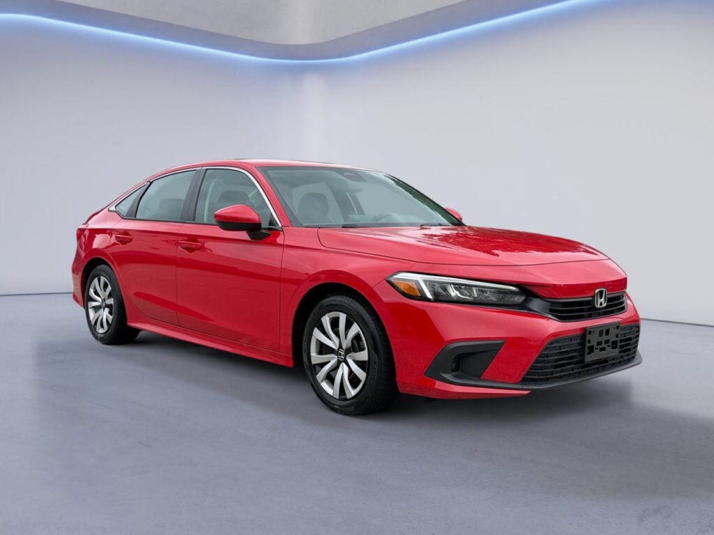 Red Honda Civic sedan in studio