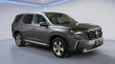Gray Honda SUV in studio showroom