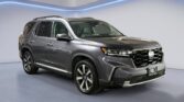 Gray Honda SUV in showroom