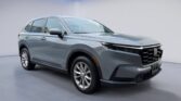 Gray midsize SUV displayed in showroom
