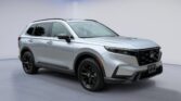 Silver Honda SUV in white showroom