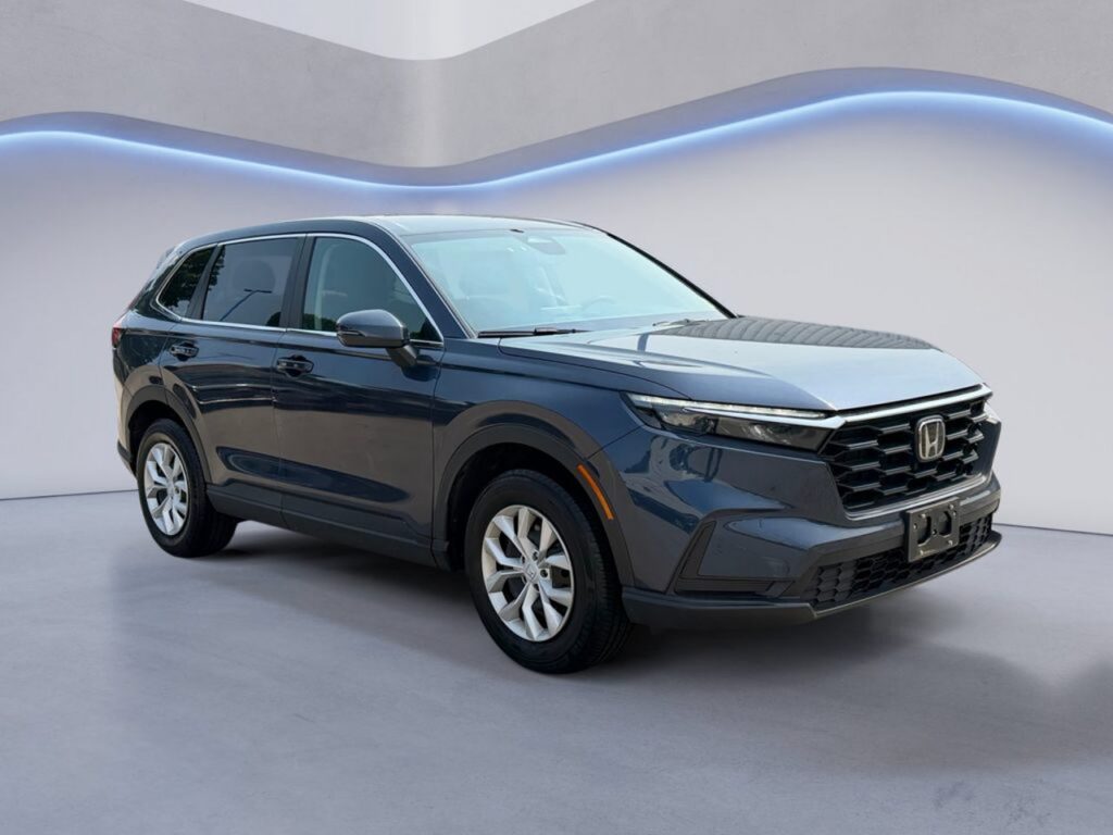 Dark gray Honda SUV in showroom