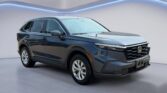 Dark gray Honda SUV in showroom