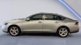 Silver sedan side profile in studio