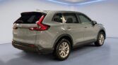 Silver Honda CR-V SUV parked in showroom