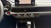 Car dashboard with infotainment and climate controls