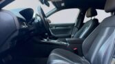 Modern car interior with black leather seats