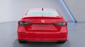 Red Honda Civic rear view in studio