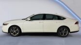 White sedan car side view in studio