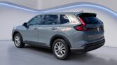Silver Honda CR-V SUV in showroom