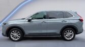 Silver crossover SUV side profile in studio