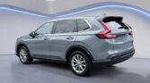 Silver-gray SUV parked in showroom
