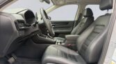 Car interior with black leather front seats
