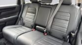 Three black leather rear car seats
