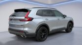 Silver SUV rear three-quarter view in showroom