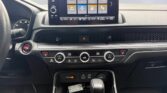 Car center console with touchscreen and gear shifter