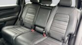 Black leather rear car seats with seatbelts